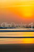 Vertical vivid orange motion blur ocean landscape abstraction ba