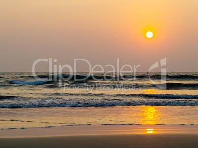 Horizontal vivid sunset on ocean beach landscape background back