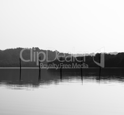 Horizontal black and white fishing nets reflections background b