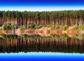 Horizontal vivid river side dramatic forest reflection backgroun