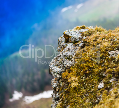 Horizontal vivid high altitude mountain rock  bokeh background b