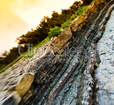 Horizontal viviid geological rock cut bokeh background backdrop