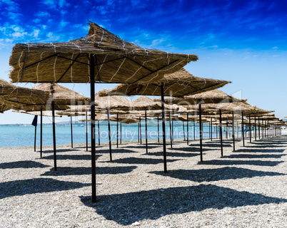 Horizontal vivid beach umbrellas background backdrop