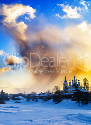 Vertical burning sunset near Russian churches background backdro