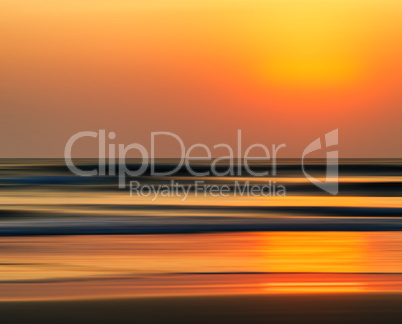 Horizontal vivid orange golden Indian ocean sunset motion abstra