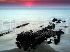 Horizontal vivid vibrant Indian sunset ocean milk landscape back