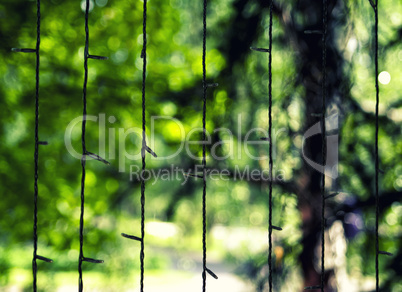 Vertical garland with green bokeh background backdrop