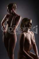Homosexual. Attractive women posing nude in studio