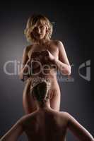 Lesbian. Charming blondes posing naked at camera