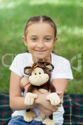 The girl with a soft toy