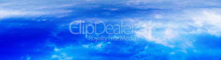 Horizontal wide panorama blue vivid above cloudscape background