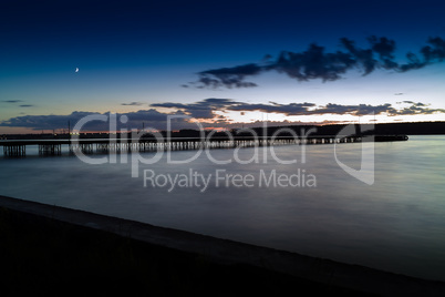 Horizontal vivid vibrant sunset pier dock background backdrop