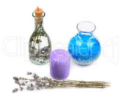 lavender water, salt and aromatic candle isolated on white backg