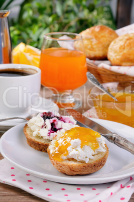 Breakfast of bun with ricotta