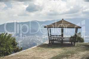 Wooden gazebo high in the mountains