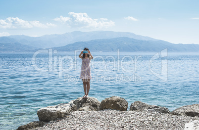 Woman taking pictures with smartphone