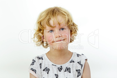 Portrait of a girl with blond hair and blue eyes