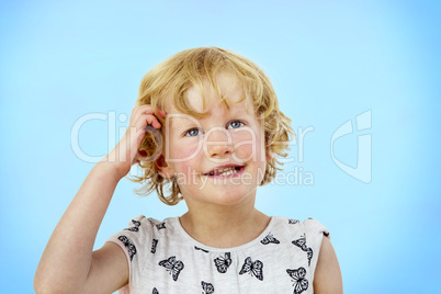 Portrait of a girl with blond hair and blue eyes