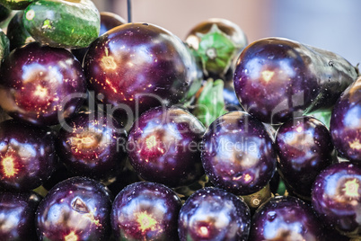 Group of many and colorful eggplants ar market