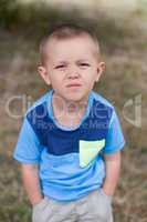 Portrait of a boy close up in nature