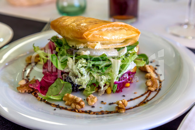 Salad with goat cheese in the restaurant