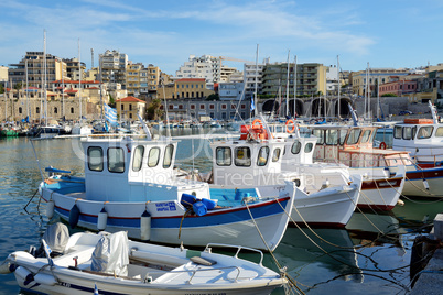 The traditional Greek fishing boat are near pier, Heraklion, Greece