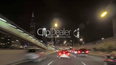 Driving at Full Speed to Downtown Chicago at Night