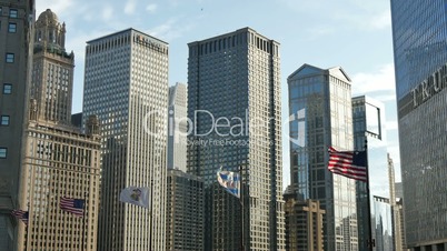 American Flags Waving under Chicago Skyline