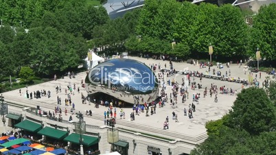 Tourists at the Chicago Bean Monument in Millennium Park