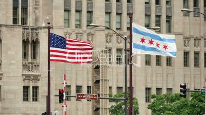 United States and Chicago Flags Waving on Michigan Bridge