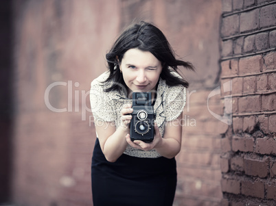 Woman taking photo outdoors