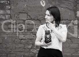 Woman with retro camera