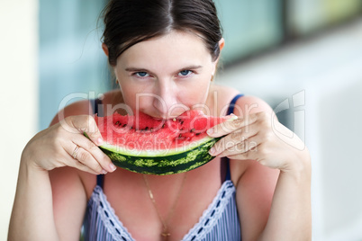 Girl eating watermelon