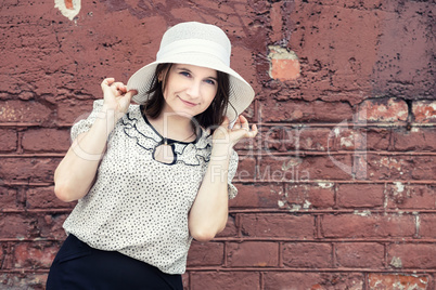 Smiling woman in hat