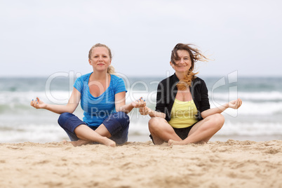 Womans in lotus pose