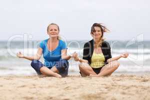 Womans in lotus pose