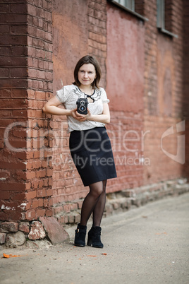 Girl with vintage camera