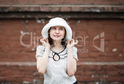 Woman in white hat