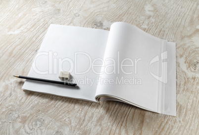 Brochure, pencil and eraser