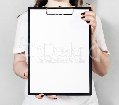 Blank paper in clipboard