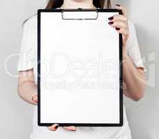 Blank paper in clipboard