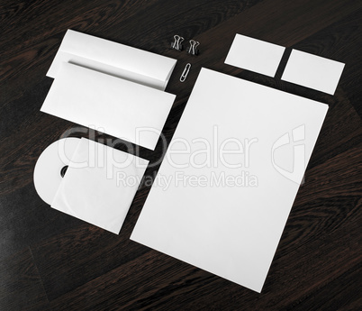 Blank stationery on wooden background