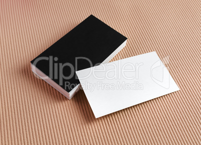 Business cards on color background