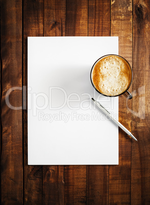 Blank letterhead, coffee and pen