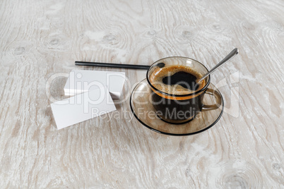 Business cards and coffee