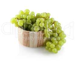 Grapes in a wooden tub