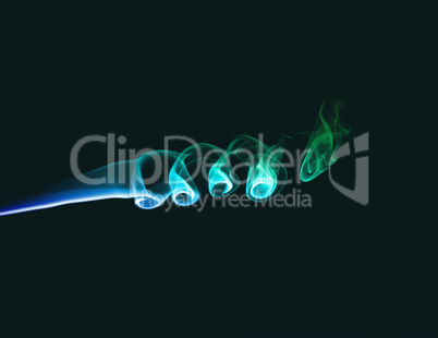 Colored smoke on dark green background