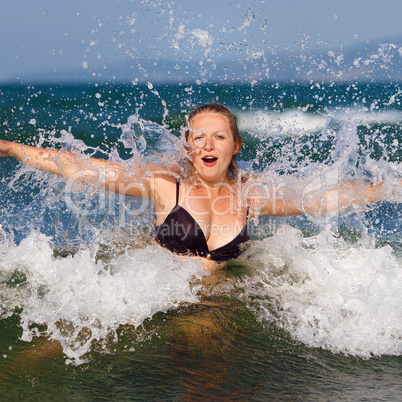 Woman bathing in the sea