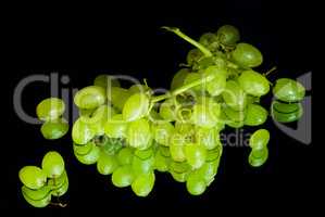 Green grapes on black