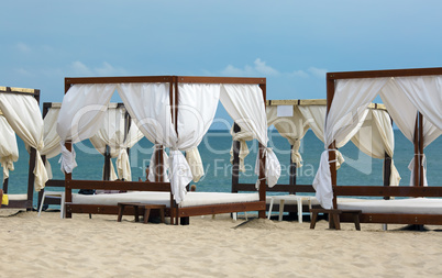 Several canopies on the beach